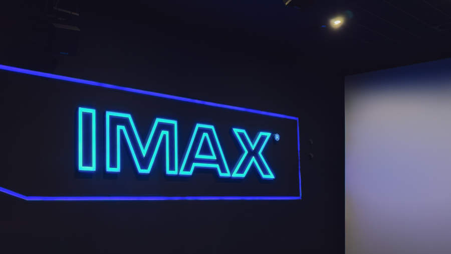 Are there any disadvantages to using IMAX theaters?