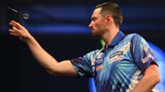 Humphries into Grand Prix semis as Van Veen exits
