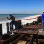 Powerful waves lash California coast as storm threatens more damage